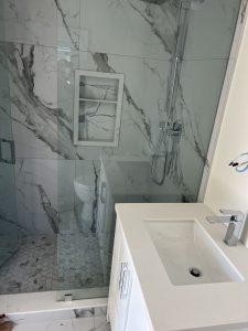 new finished bathroom and glass shower